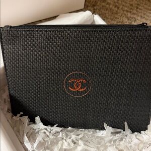 Chanel Raffia Black and Gold CC POUCH. New. Measures 8 1/2 x 6 1/2”. GWP.